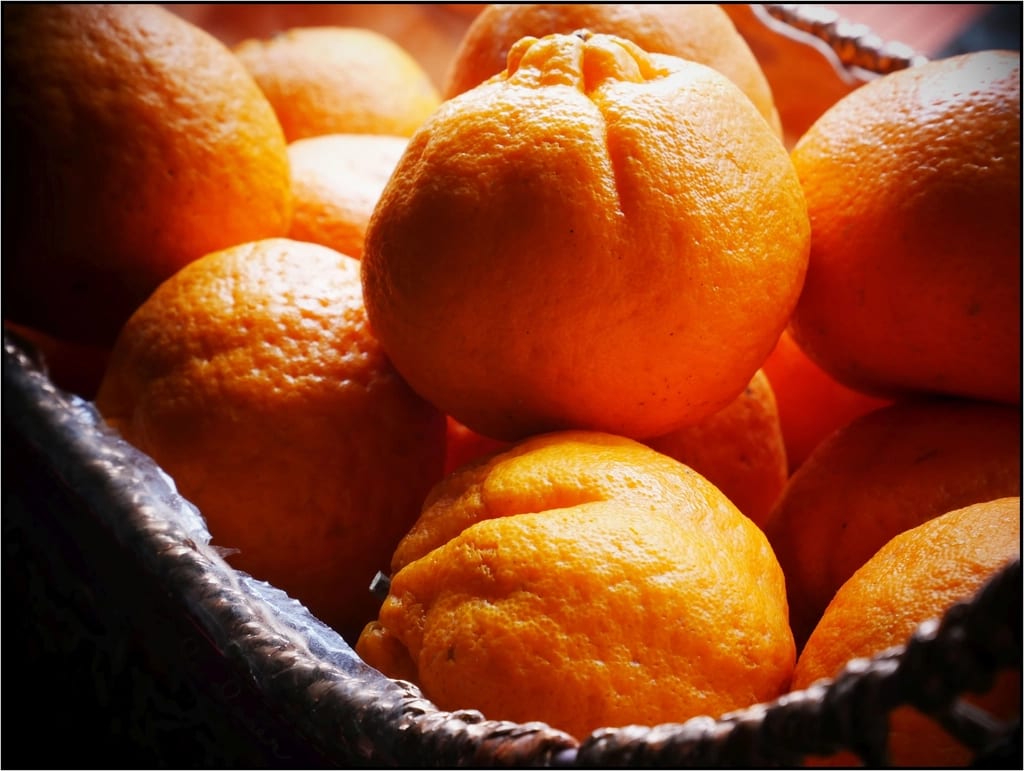 Ripe mandarin oranges in a basket