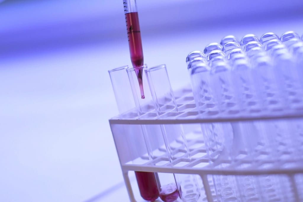 A scientist running a blood test