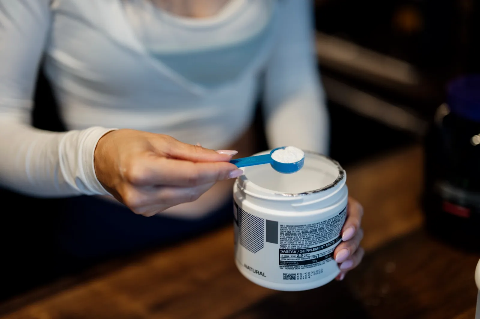 A scoop of sports supplement powder