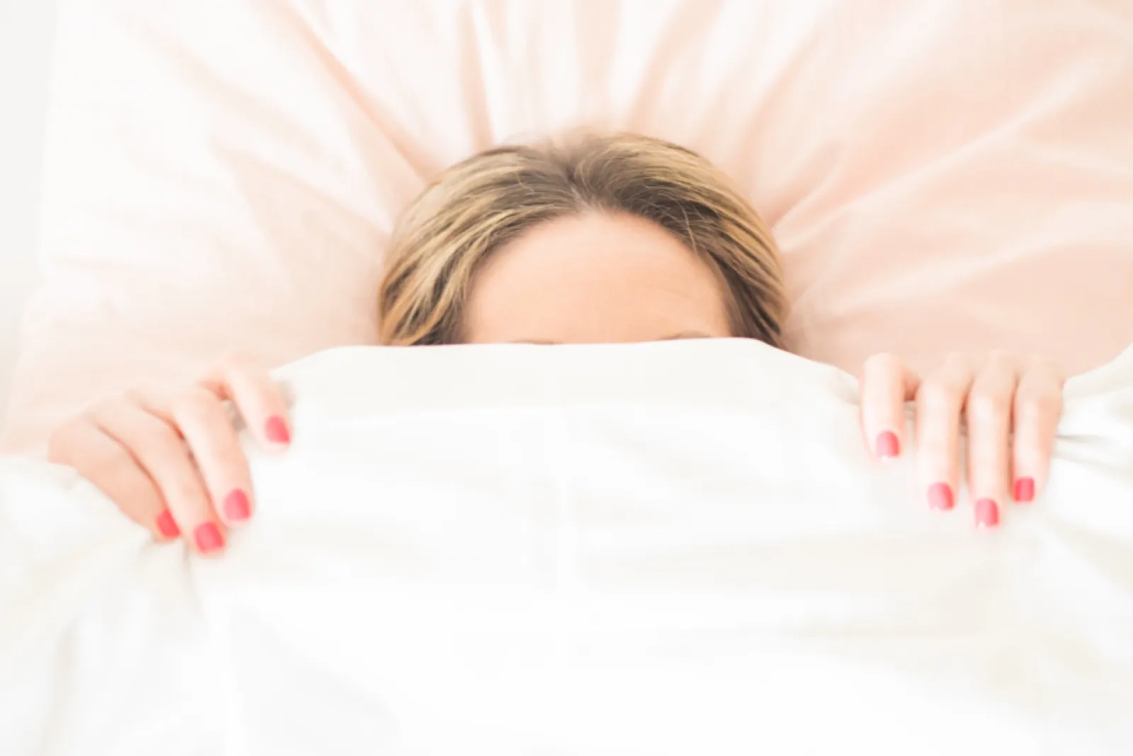 A person asleep in bed