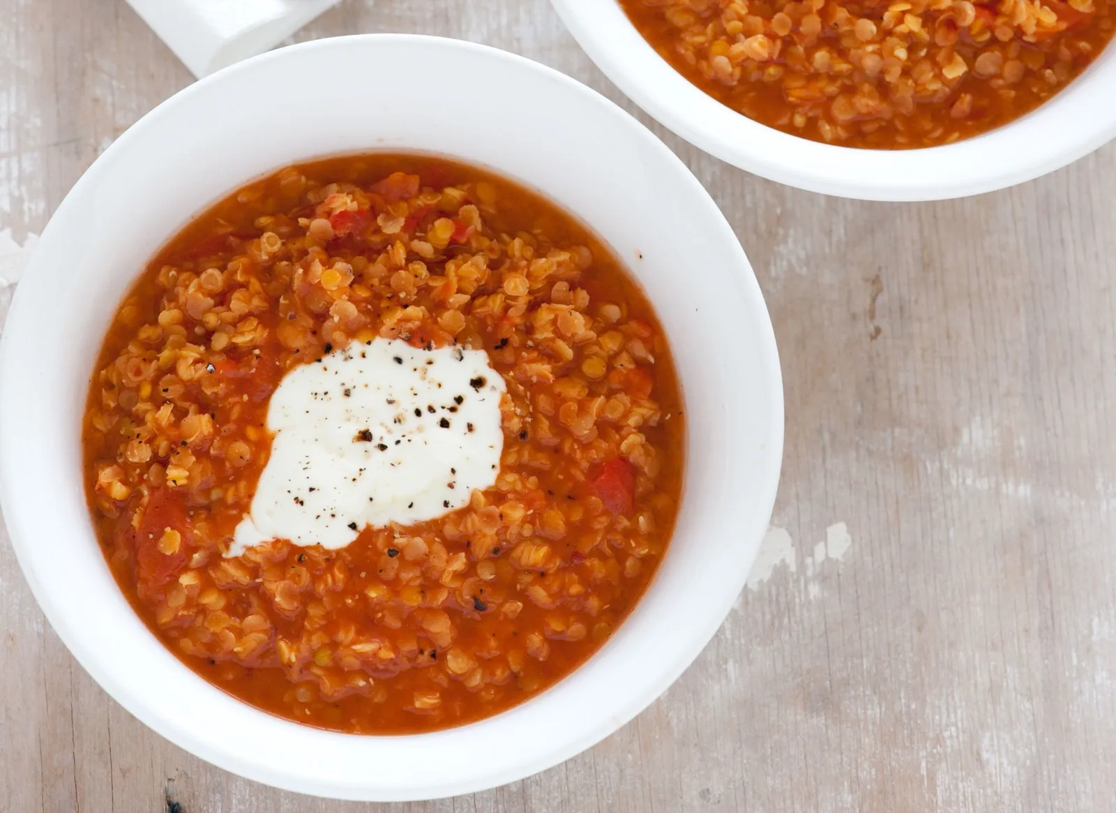 A bowl of red lentil soup