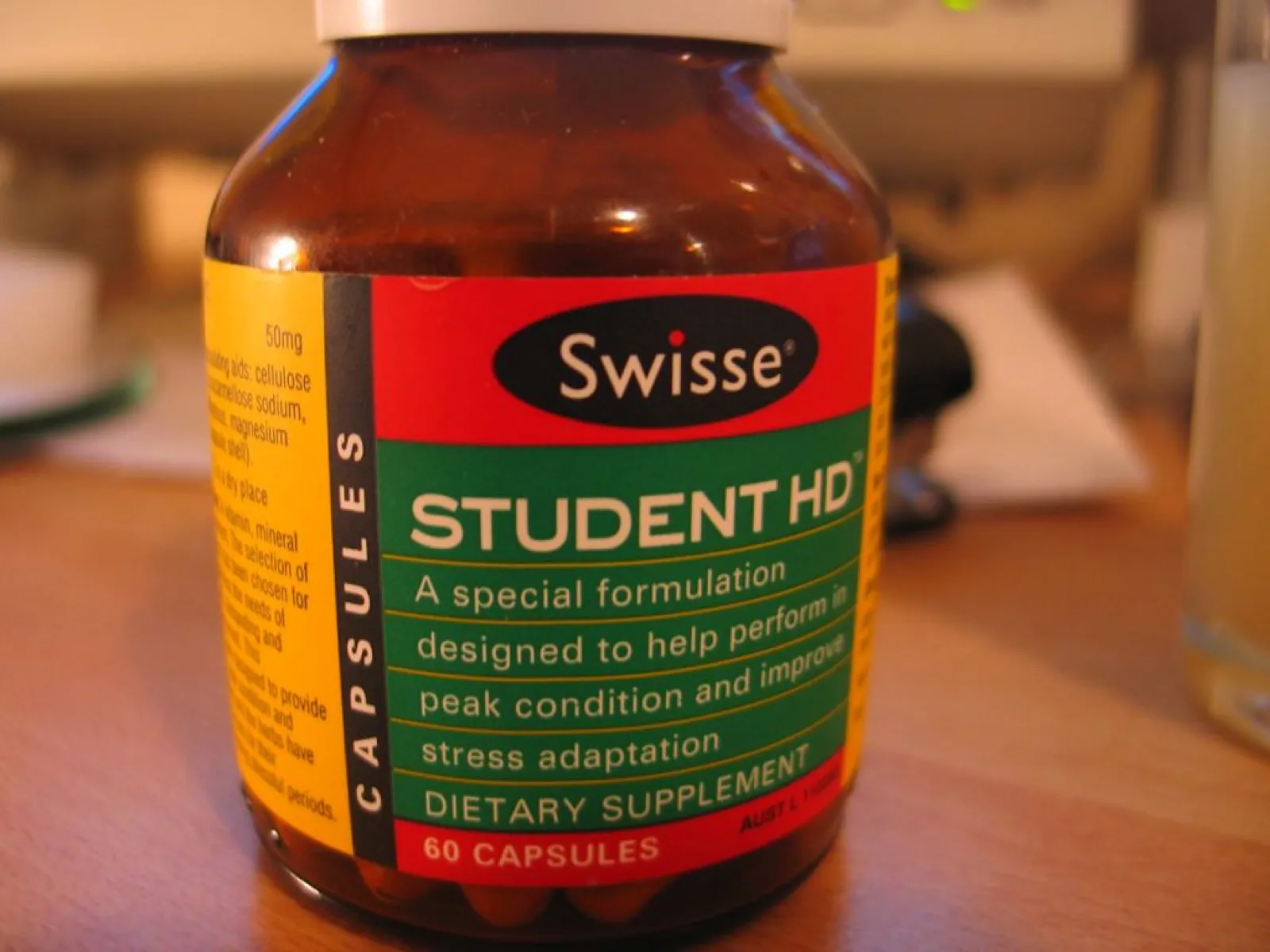 Vitamin capsules and a bottle
