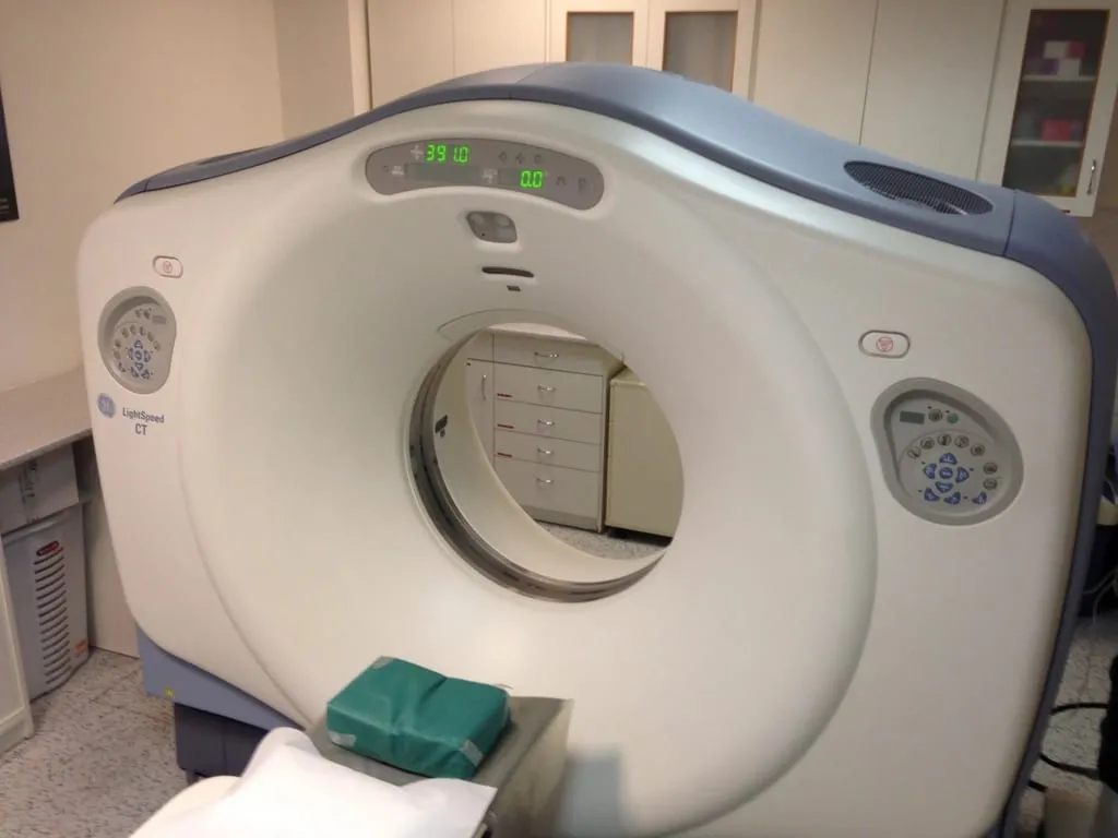 A CT scanner in a hospital room