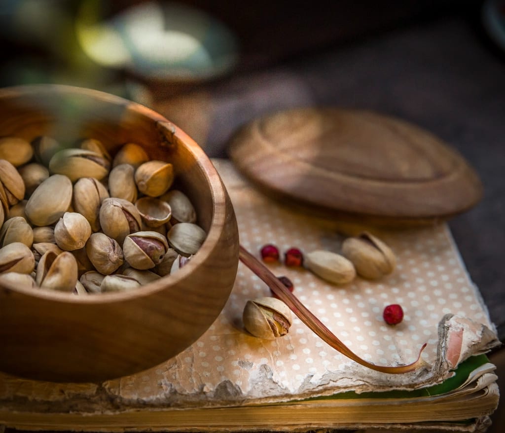 Pistachios in a wooden bowl
